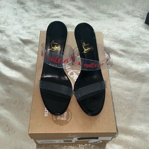 Brand new, NEVER worn, black and red authentic Christian Louboutin sandal